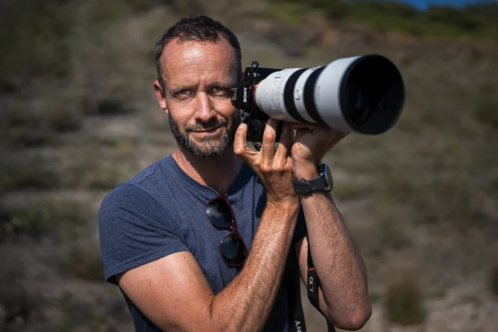 Ed Charles photographing wildlife