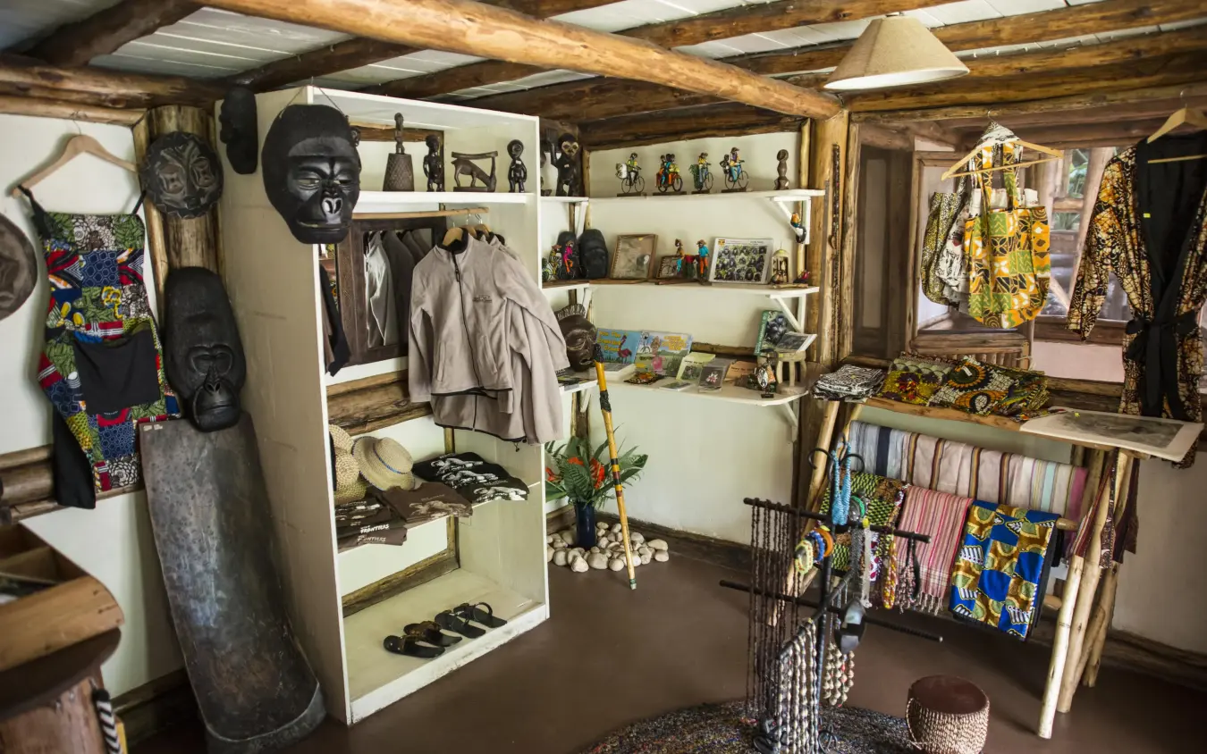 Craft shop interior displaying African textiles and sculptures, Buhoma Lodge, Bwindi Impenetrable Forest, Uganda
