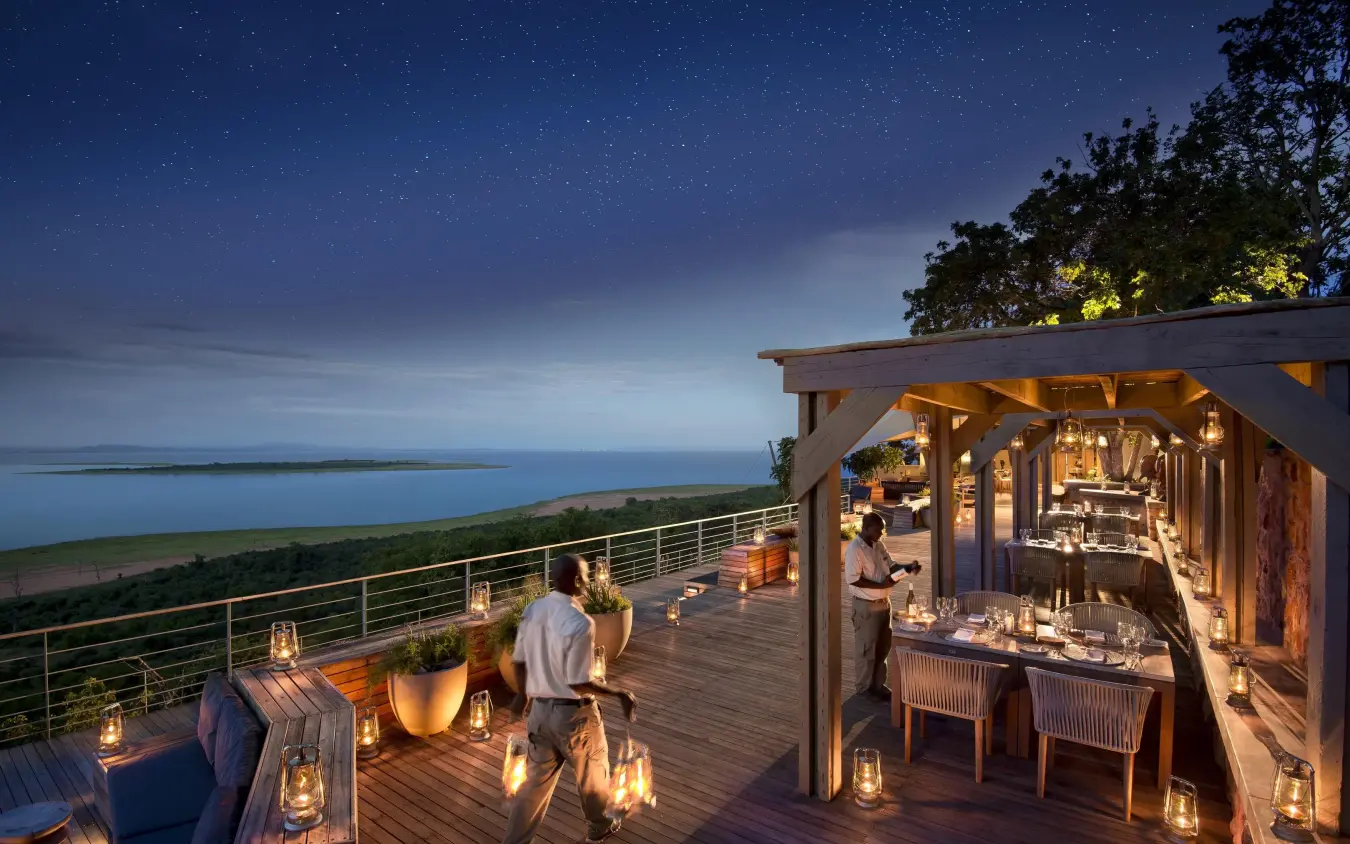 Elevated deck overlooking water and landscape at dusk, Bumi Hills Safari Lodge, Matusadona National Park, Zimbabwe