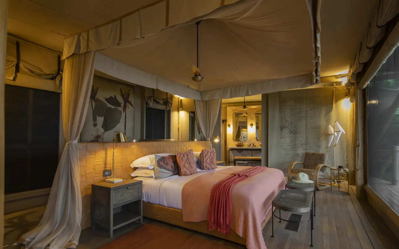 Luxury bedroom tent with four-poster bed and ensuite bathroom, DumaTau, Linyanti Wildlife Reserve, Botswana