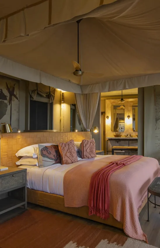 Luxury bedroom tent with four-poster bed and ensuite bathroom, DumaTau, Linyanti Wildlife Reserve, Botswana