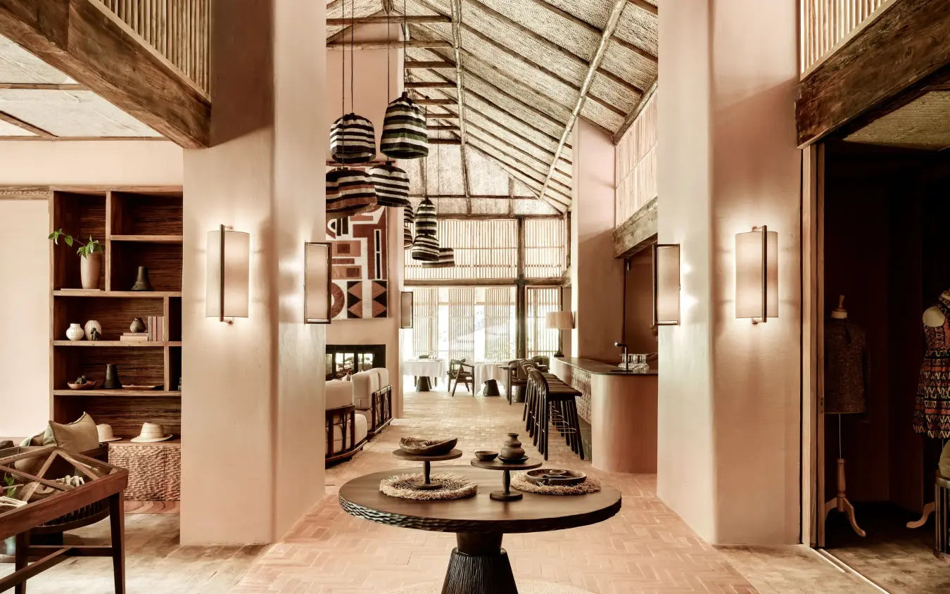 Modern lodge interior with high ceilings and pendant lighting, Gorilla Forest Lodge, Bwindi Impenetrable Forest, Uganda