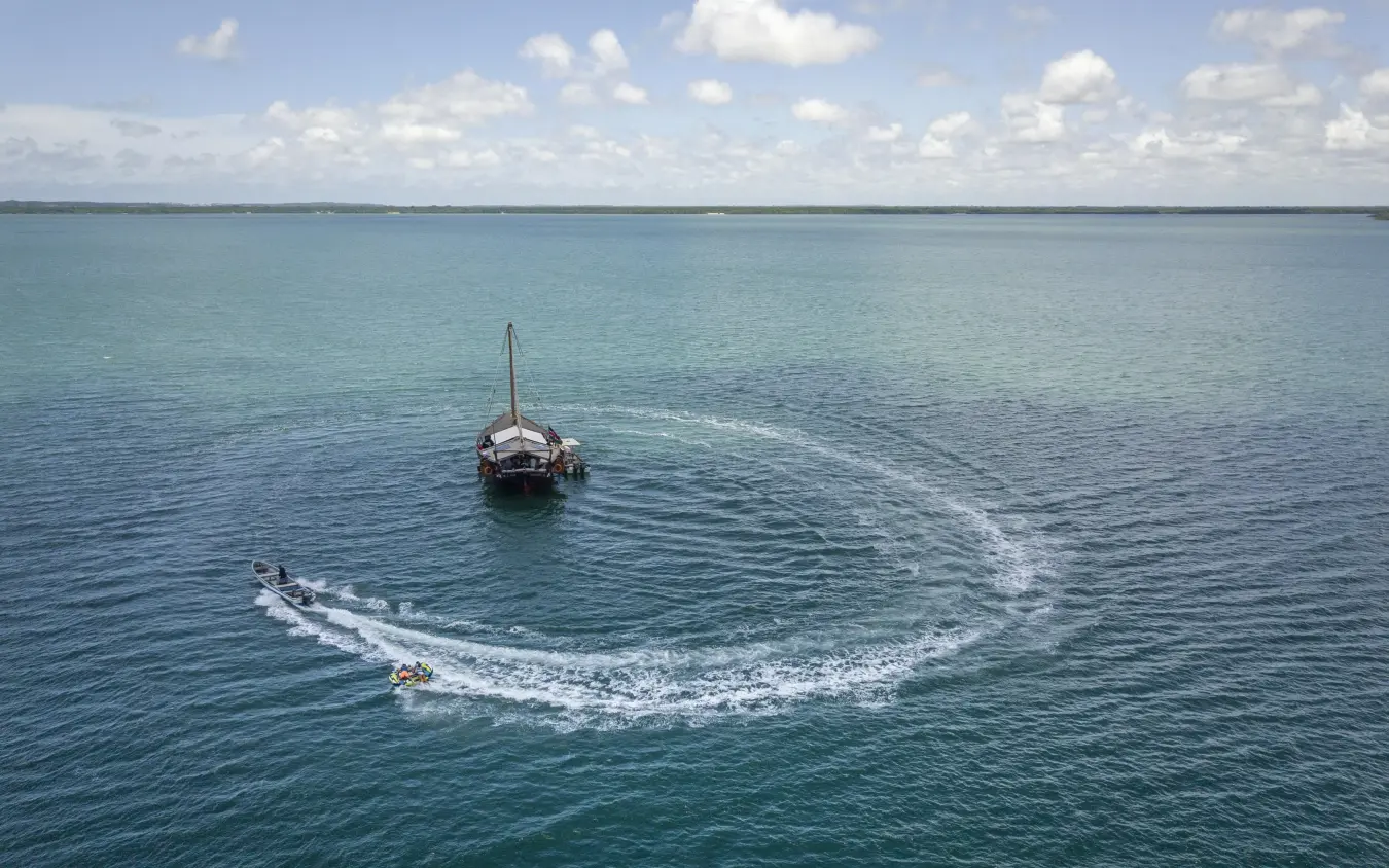 Traditional sailing dhow with guests in ocean waters, Tusitiri Dhow, Lamu Archipelago, Kenya