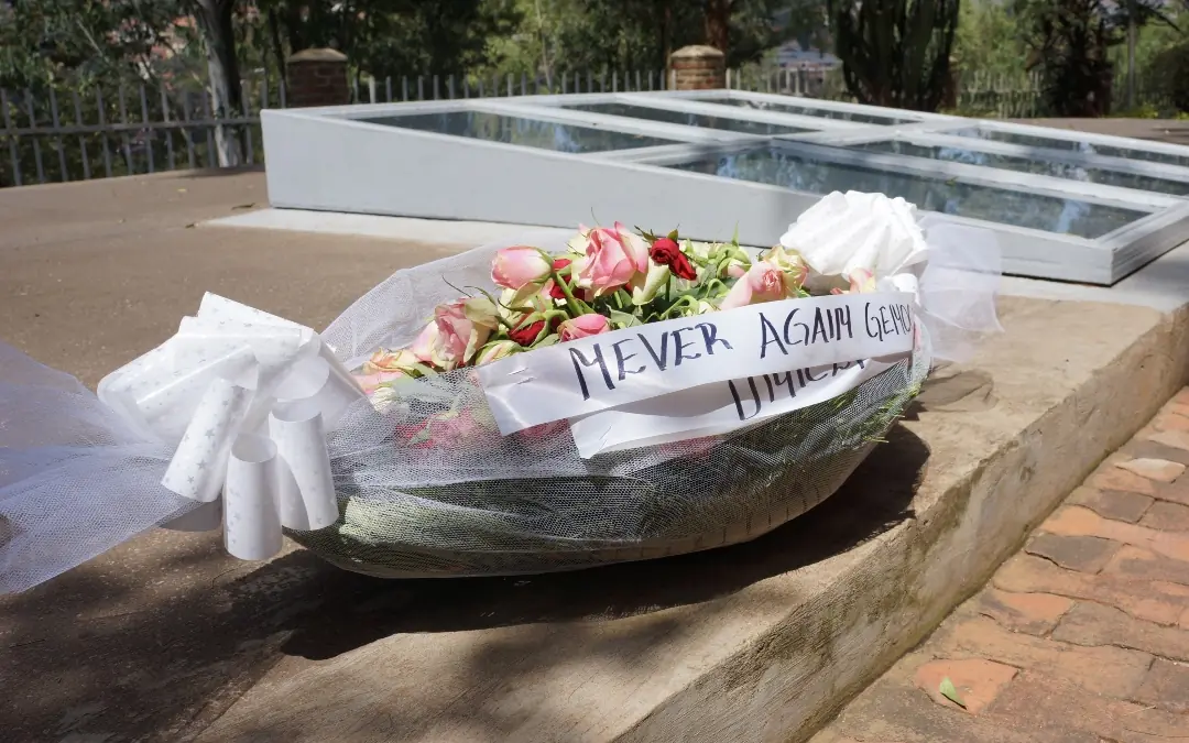 Memorial flowers and ribbons at outdoor stone memorial site, Kigali Serena Hotel, Kigali, Rwanda