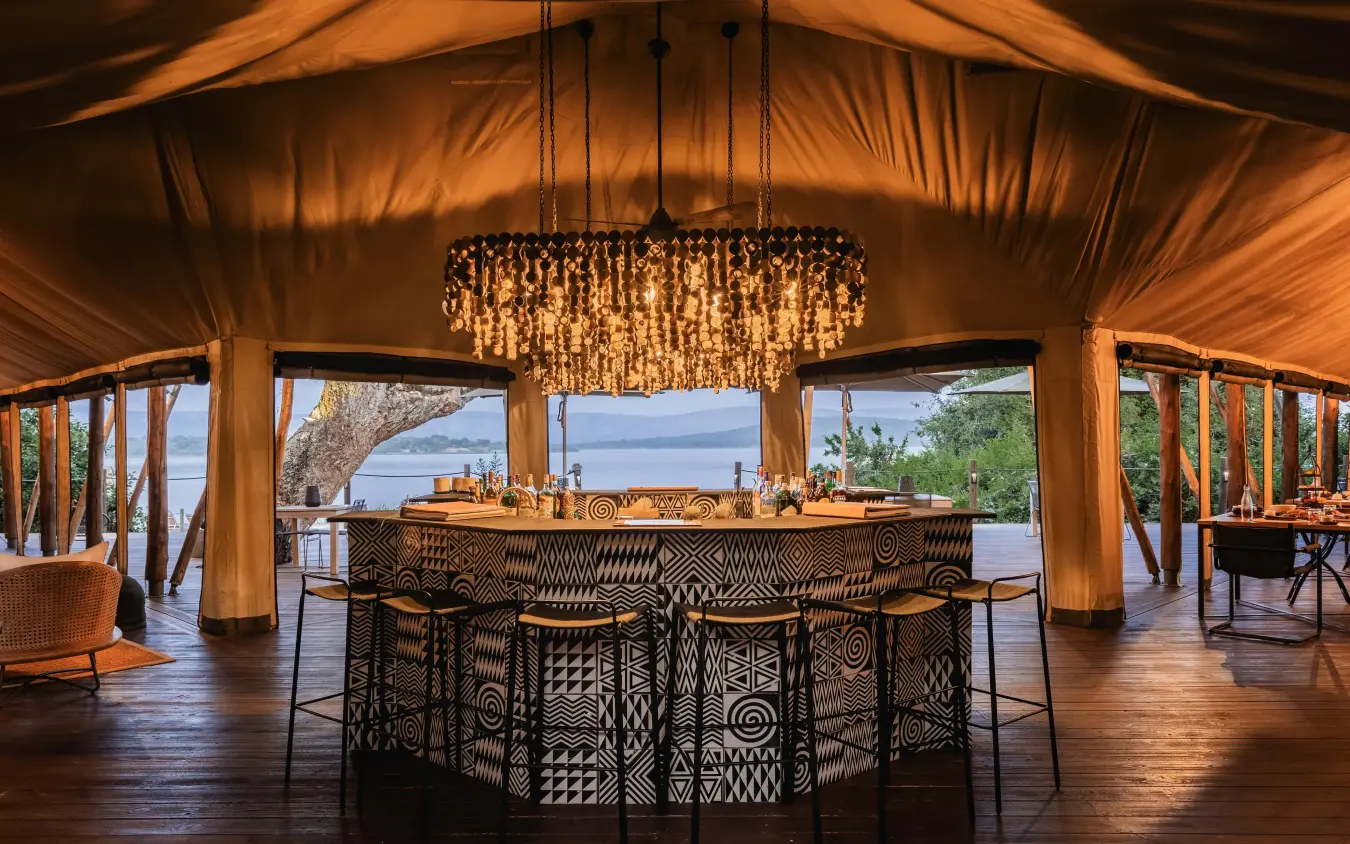 Open-sided lounge tent with bar and lake views, Magashi Camp, Akagera National Park, Rwanda