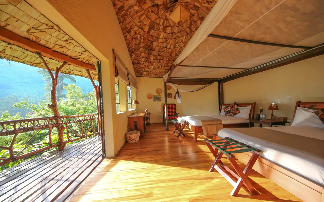 Spacious bedroom with wooden deck and mountain views, Mahogany Springs, Bwindi Impenetrable Forest, Uganda