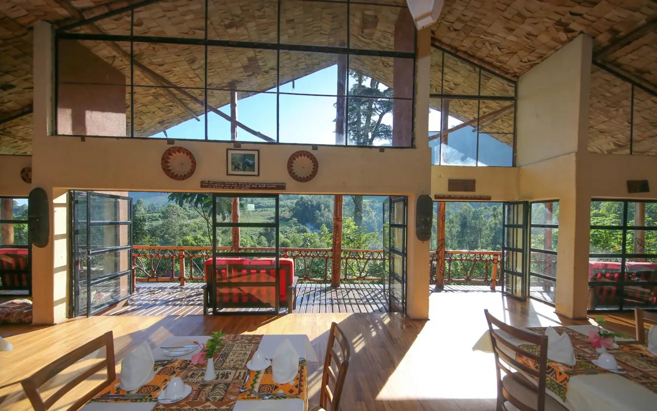 Open-air dining and lounge area with mountain views, Mahogany Springs, Bwindi Impenetrable Forest, Uganda