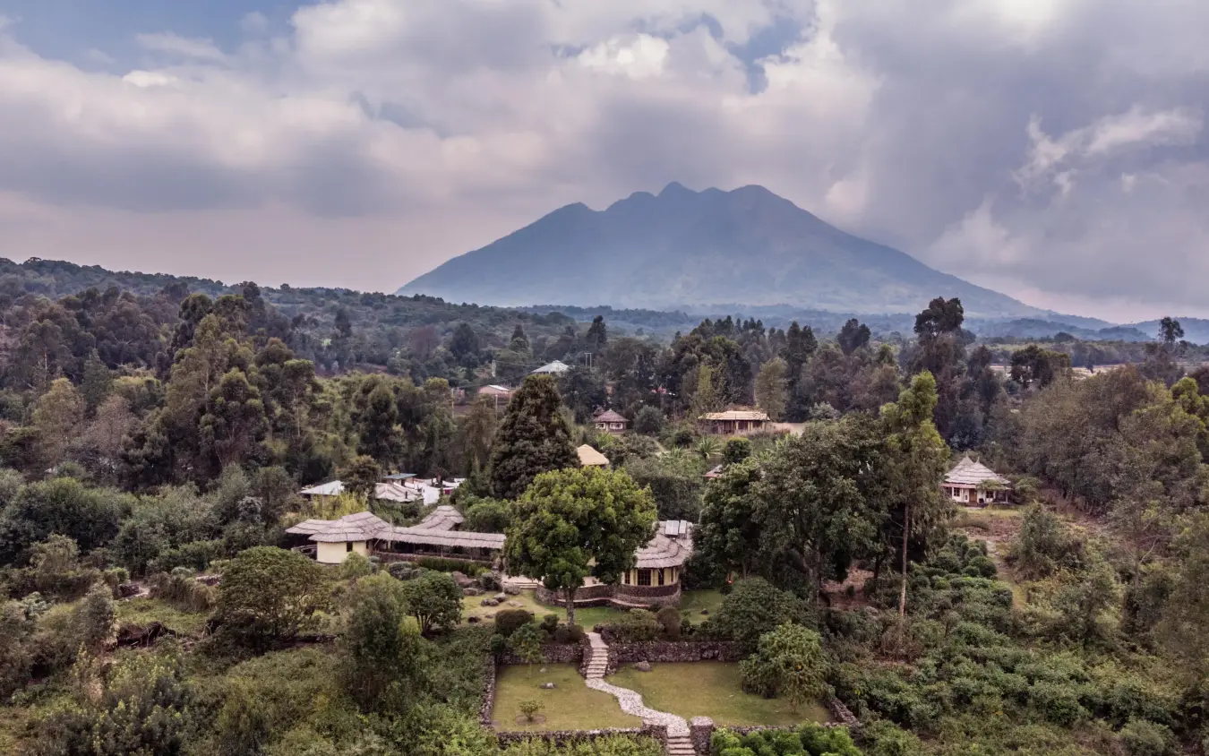 Aerial view of lodge buildings surrounded by lush forest, Mount Gahinga Lodge, Mgahinga National Park, Uganda