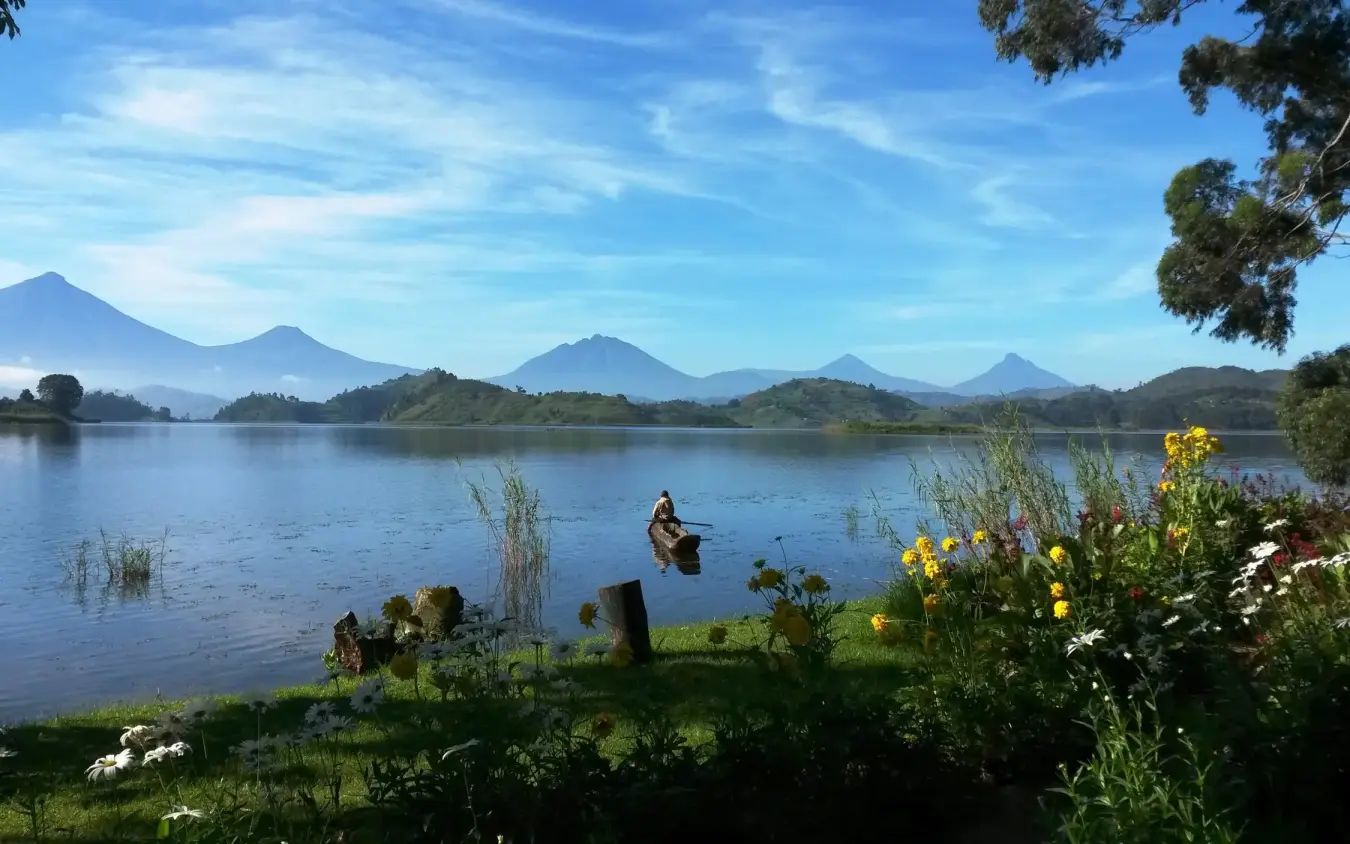 Lake view with volcanic peaks and waterfront vegetation, Mutanda Lake Resort, Lake Mutanda, Uganda