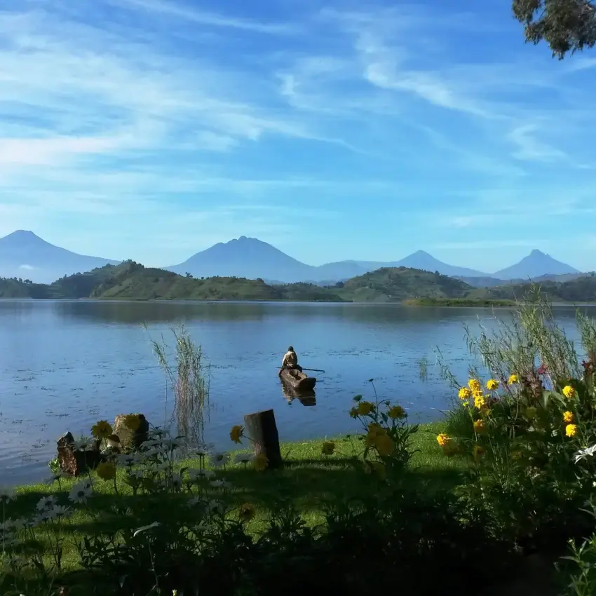 Lake view with volcanic peaks and waterfront vegetation, Mutanda Lake Resort, Lake Mutanda, Uganda