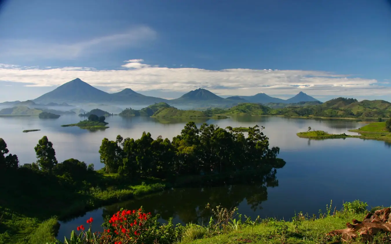 Lake surrounded by forested islands with volcanic mountains, Mutanda Lake Resort, Lake Mutanda, Uganda