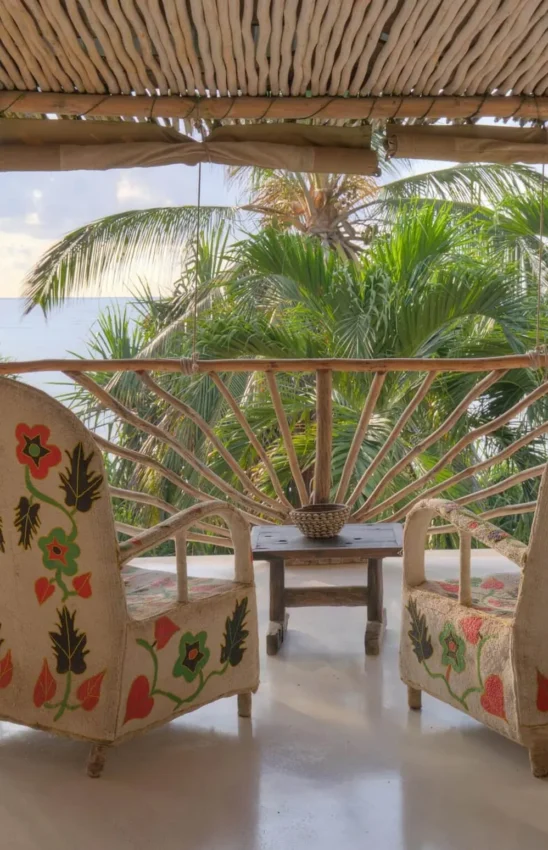 Beachfront pavilion with woven chairs and palm tree views, Alfajiri Beach Villa, Diani Beach, Kenya