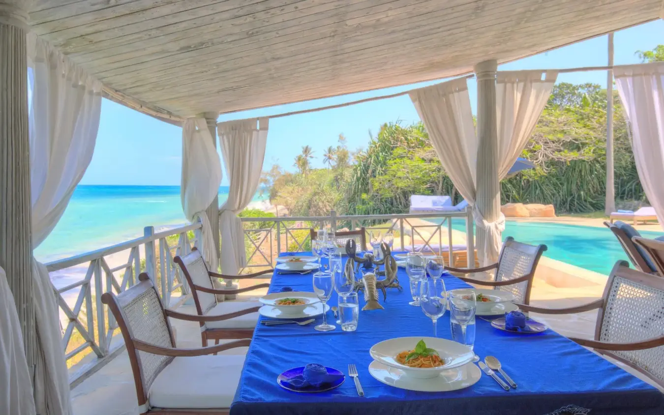 Beachfront dining pavilion with ocean views and turquoise waters, Alfajiri Cliff Villa, Diani Beach, Kenya