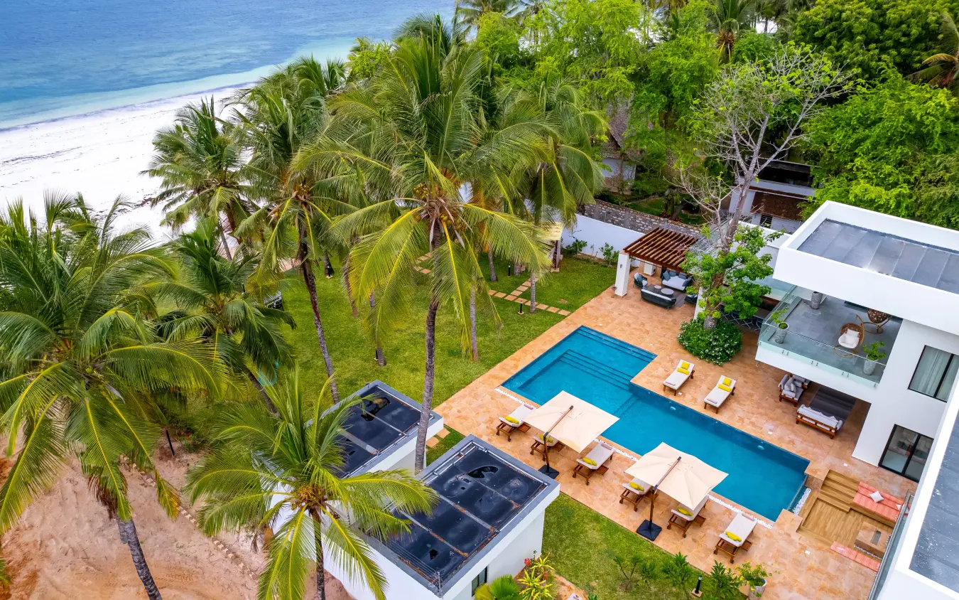 Beachfront villa with swimming pool and palm trees overlooking ocean, Bahari Bliss, Kilifi, Kenya