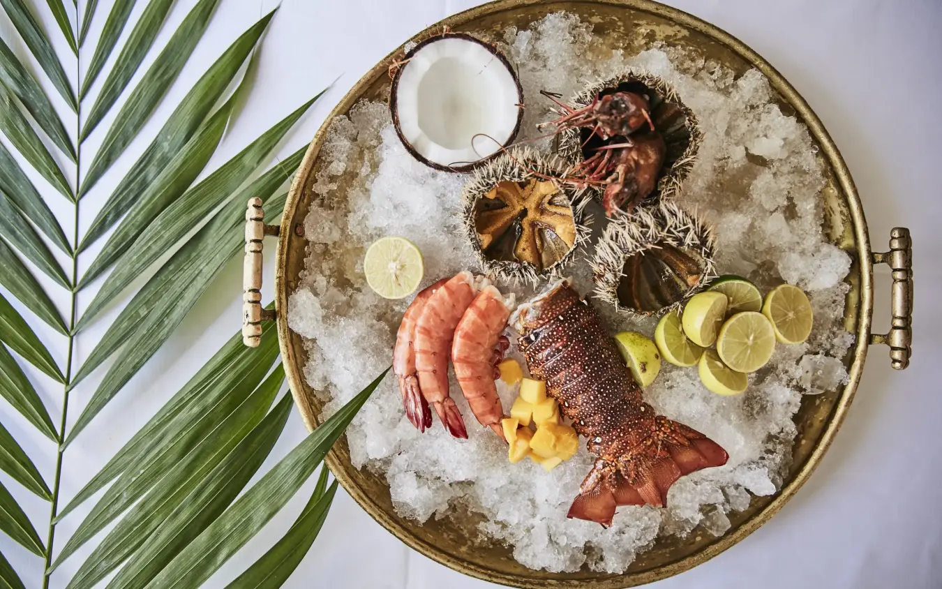 Seafood platter with fish, shrimp, and garnishes on ice, Baraza Resort and Spa, Zanzibar & Pemba, Tanzania
