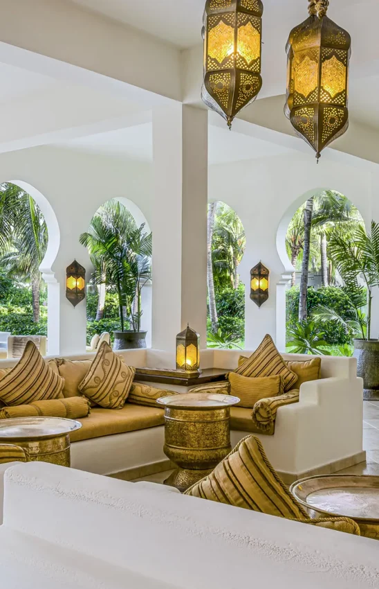 Moroccan-style lounge with golden cushions and arched windows, Baraza Resort and Spa, Zanzibar & Pemba, Tanzania