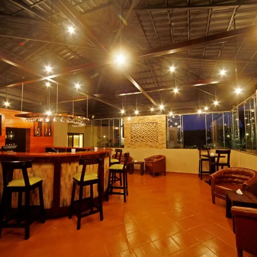 Indoor lounge and bar area with modern lighting and seating, Best Western Premier Garden Hotel Entebbe, Entebbe and Kampala, Uganda