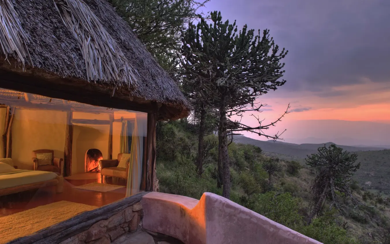 Bedroom with open views across savanna at sunset, Borana Lodge, Laikipia Highlands, Kenya