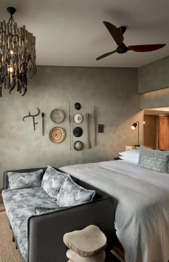 Spacious bedroom with panoramic landscape view and modern furnishings, Bumi Hills Safari Lodge, Matusadona National Park, Zimbabwe