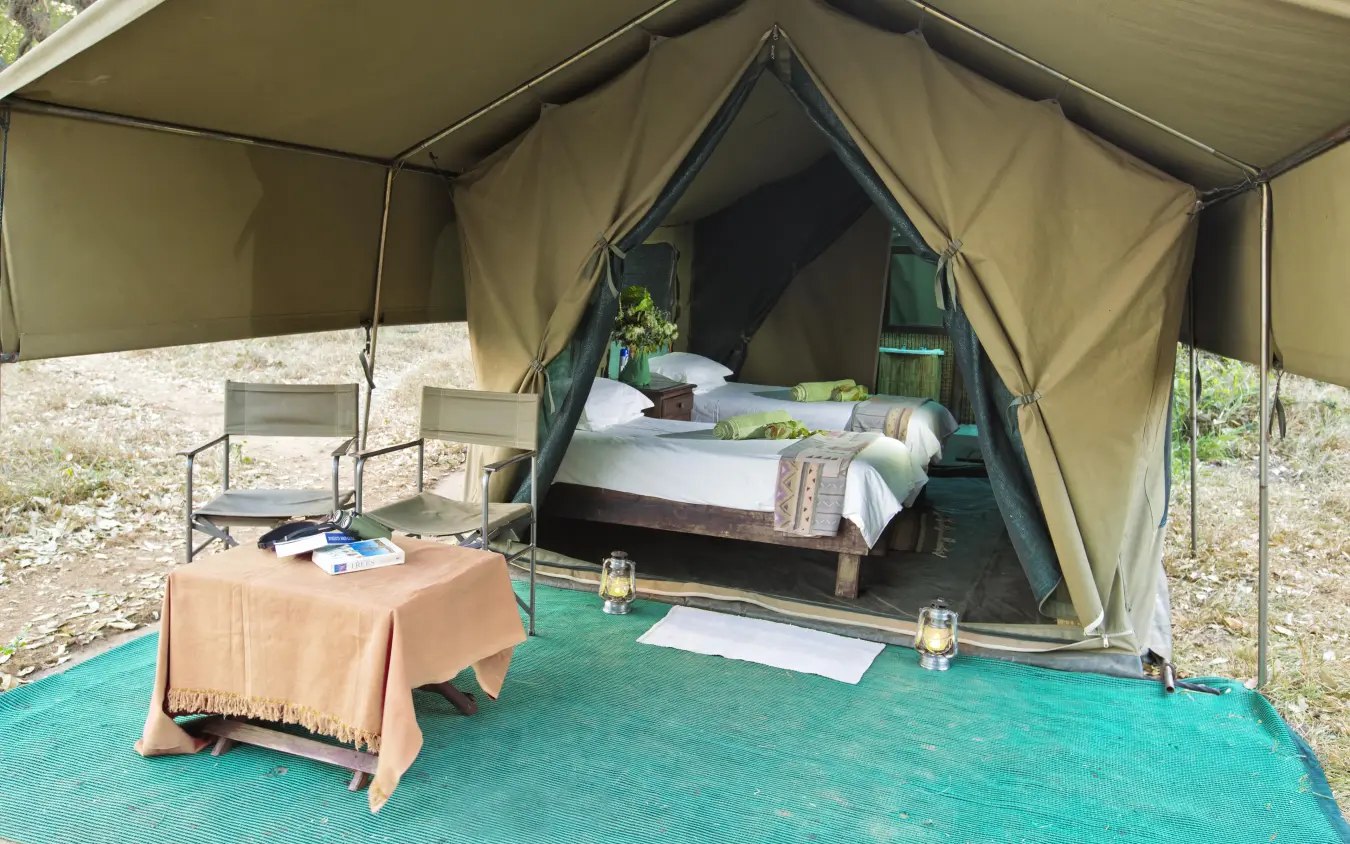 Safari tent bedroom with bed and sitting area outside, Chilo Gorge Safari Lodge, Gonarezhou & Malilangwe, Zimbabwe