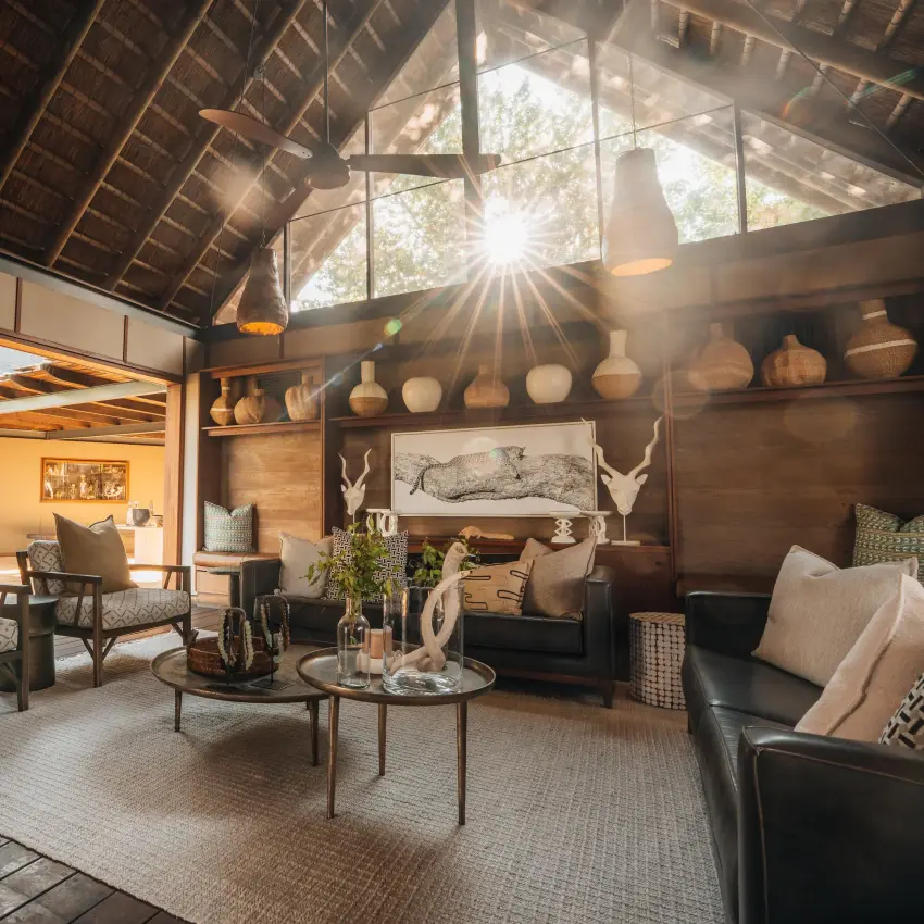 Spacious lounge with high thatch ceiling and natural light, Chitabe Camp, The Okavango Delta, Botswana