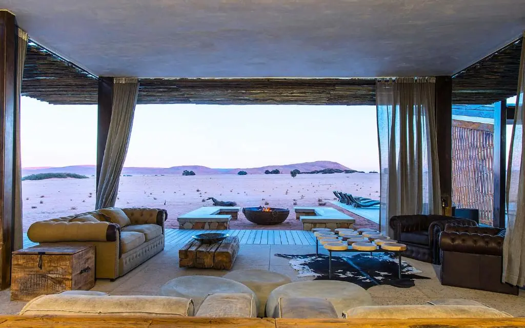 Oceanfront lounge with boats and water views, Dead Valley Lodge, Sossusvlei, Namibia