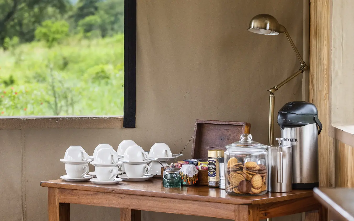 In-room hospitality setup with teacups and cookies, Dunia Camp, Serengeti National Park, Tanzania