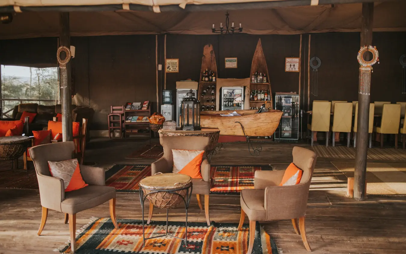 Luxury safari lodge interior with lounge seating and African décor, Elephant Bedroom Camp, Samburu Reserve, Kenya