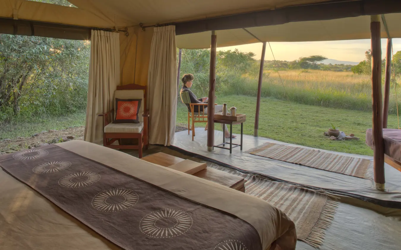 Safari bedroom with expansive views of African savanna landscape, Encounter Mara Camp, Maasai Mara, Kenya