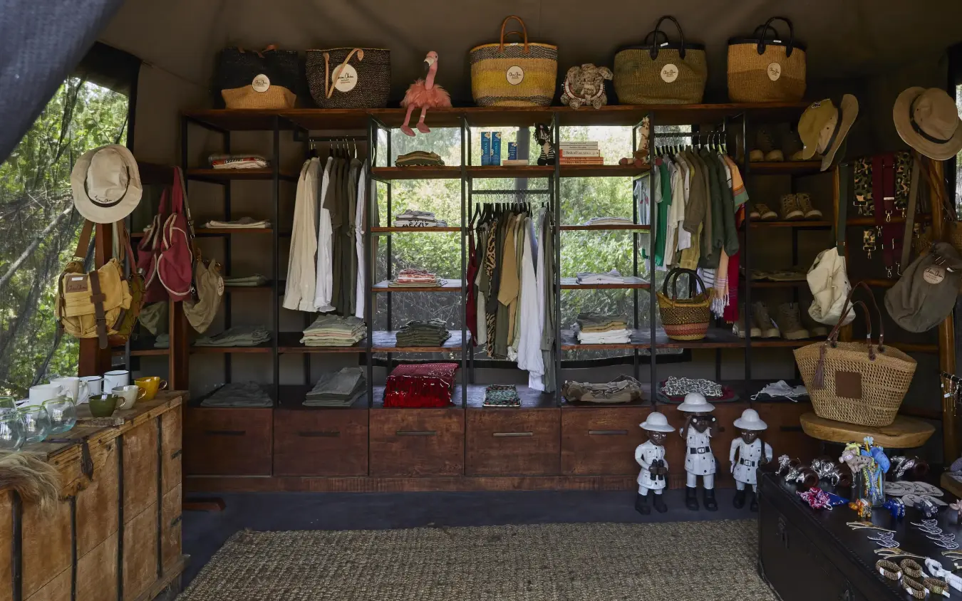 Interior view of safari lodge retail shop with clothing and accessories, Forest Chem Chem, Lake Manyara, Tanzania