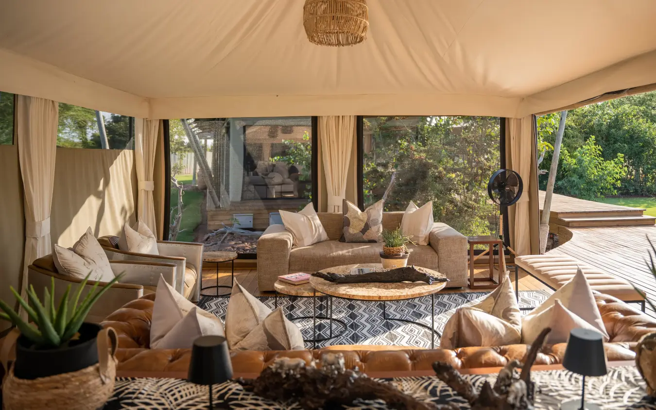Glamping tent interior with lounge area and garden views, Fothergill Island, Matusadona National Park, Zimbabwe