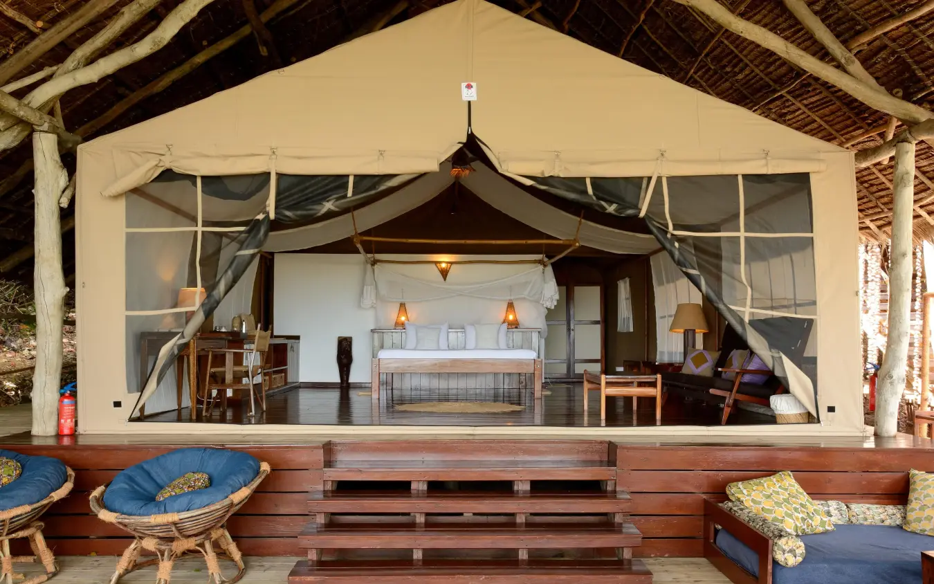 Luxury canvas tent with wooden deck and seating area, Fundu Lagoon, Zanzibar & Pemba, Tanzania