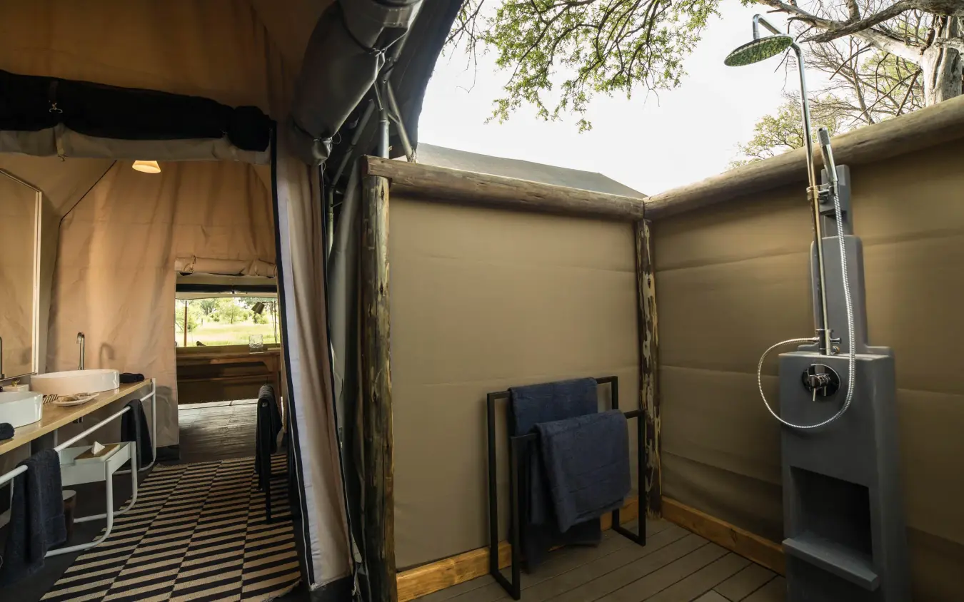 Open-air bathroom with shower and vanity area, Gomoti Plains, The Okavango Delta, Botswana