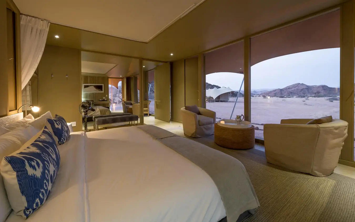 Spacious bedroom with expansive desert landscape views, Hoanib Skeleton Coast Camp, Skeleton Coast, Namibia