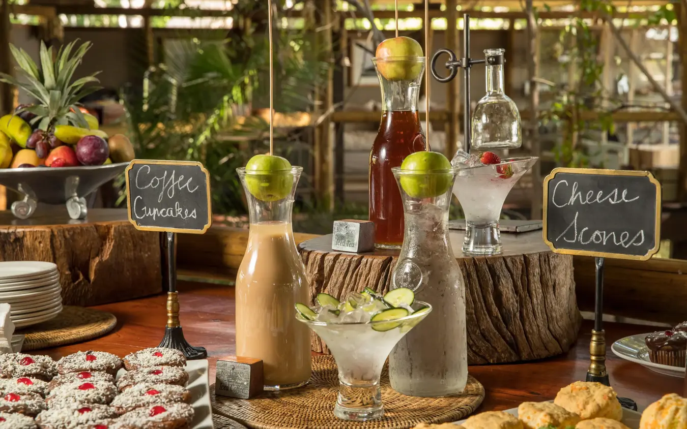 Buffet table with beverages, pastries and food items, Kanana, The Okavango Delta, Botswana