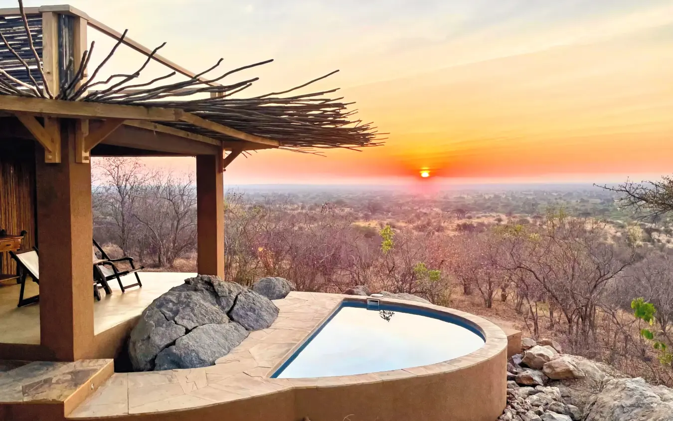 Sunset view over landscape from elevated pool area, Kichaka Expeditions, Ruaha National Park, Tanzania