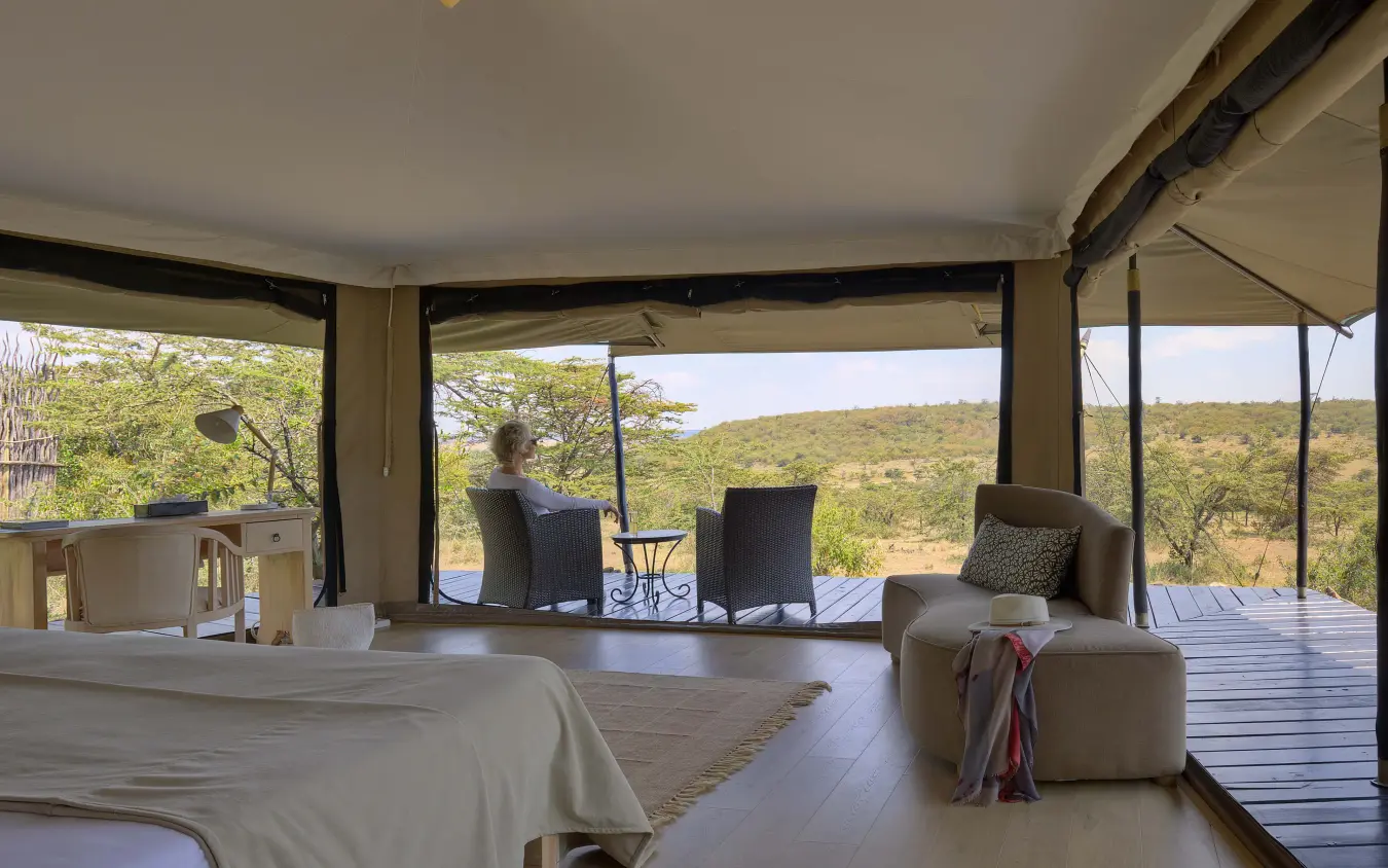 Spacious bedroom with expansive windows overlooking savanna landscape, Kicheche Valley Naboisho, Maasai Mara, Kenya