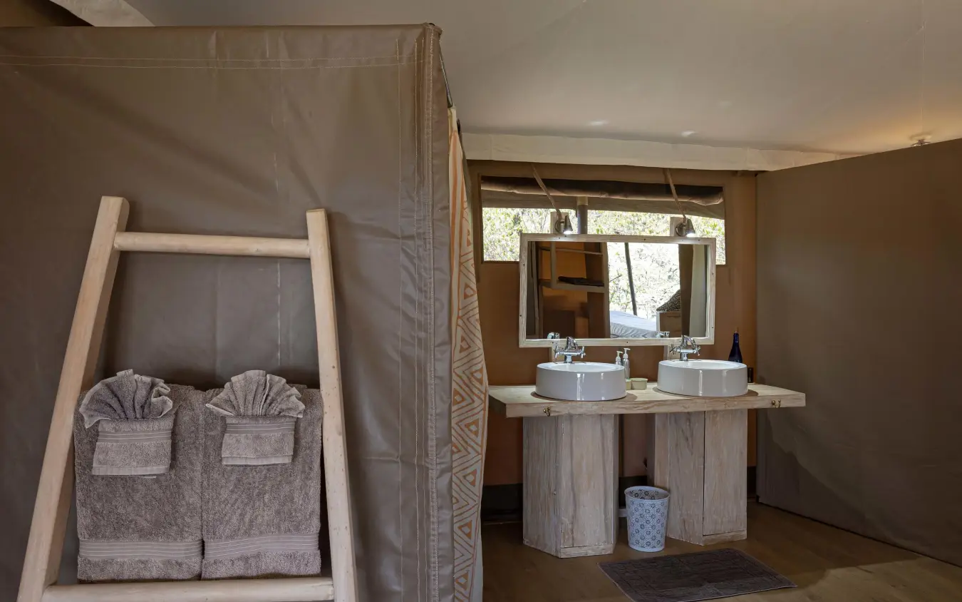 Double vanity sink with mirrors and towel rack display, Kicheche Valley Naboisho, Maasai Mara, Kenya