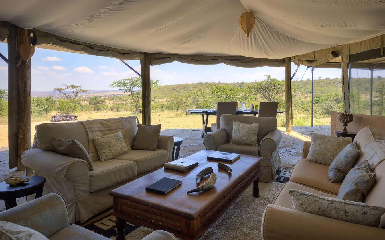Open-air lounge with safari views across African savanna, Kicheche Valley Naboisho, Maasai Mara, Kenya