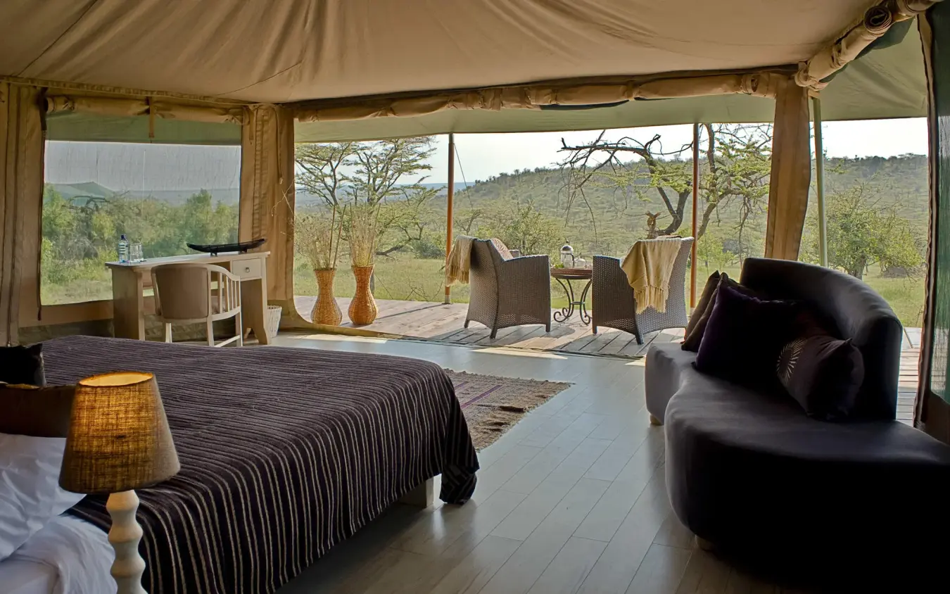 Luxury safari tent bedroom with panoramic savanna views, Kicheche Valley Naboisho, Maasai Mara, Kenya