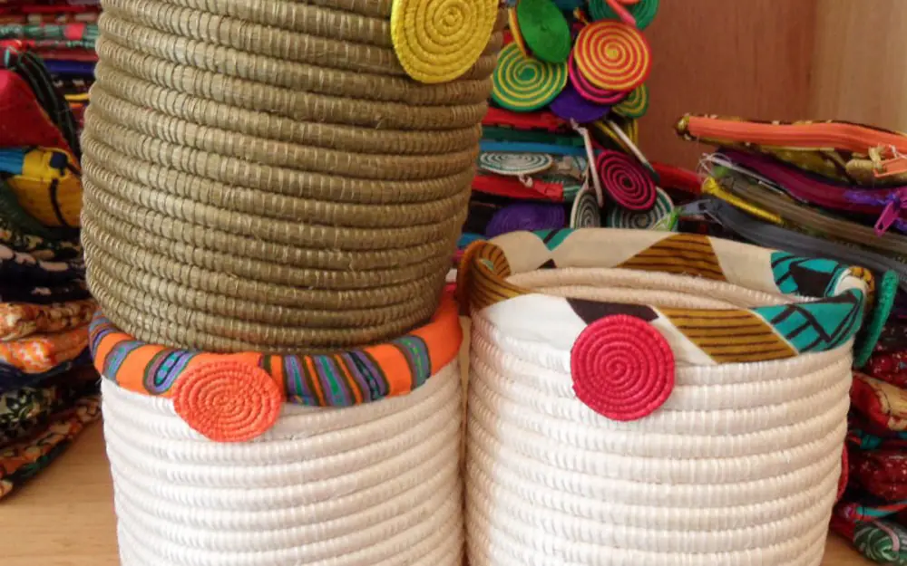 Woven baskets with colorful circular beaded decorations, Kigali Serena Hotel, Kigali, Rwanda