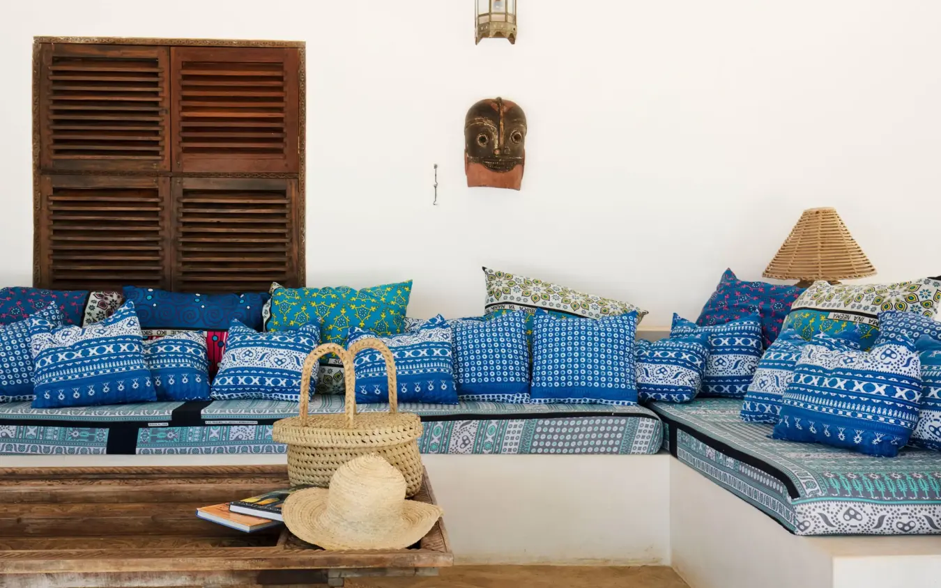 Traditional blue and white patterned seating nook with woven accessories, Kinondo Kwetu, Diani Beach, Kenya