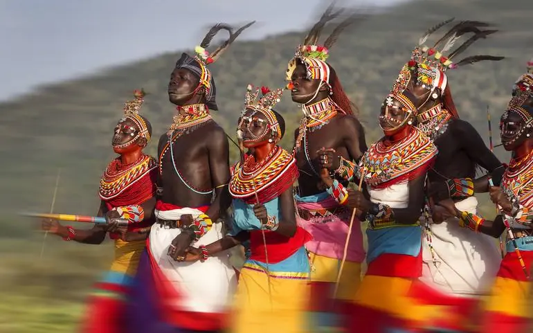 Indigenous warriors in traditional ceremonial dress and headdresses, Koros Camp, Northern Kenya, Kenya