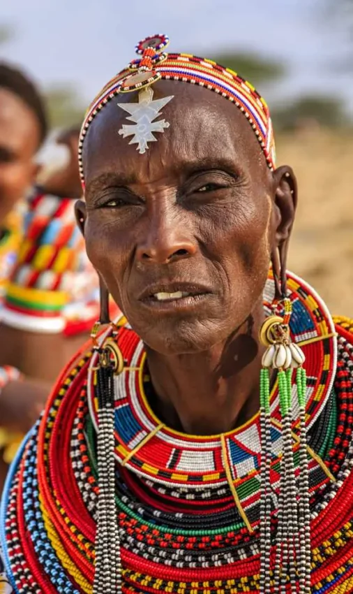 Maasai people in traditional beaded clothing and ornaments, Koros Camp, Northern Kenya, Kenya