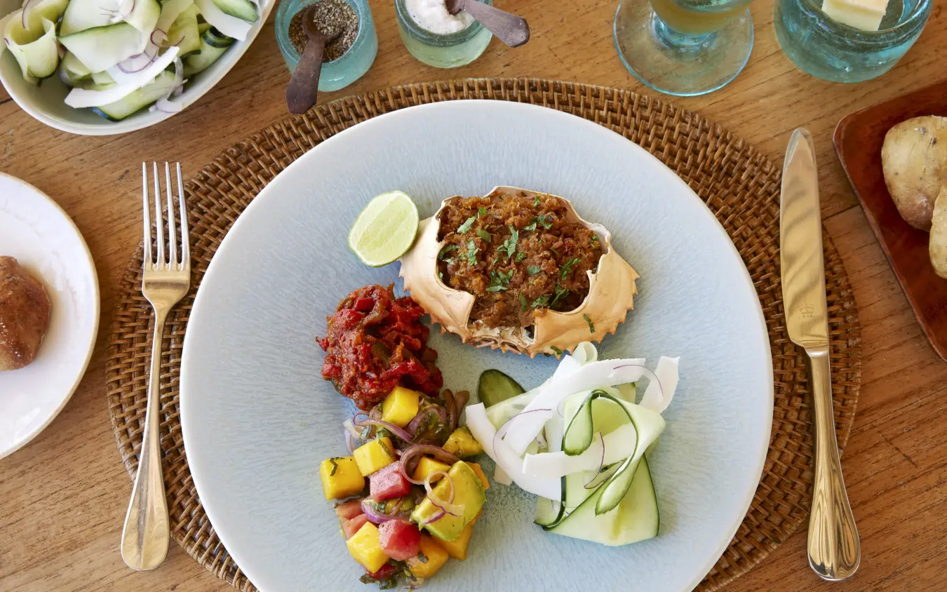 Plated gourmet meal served outdoors on wooden table at dining venue, Laba Fanjove, Zanzibar & Pemba, Tanzania