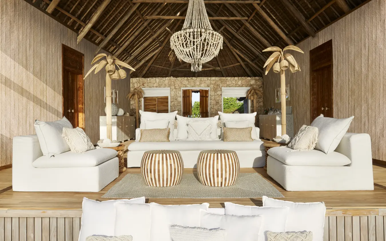 Luxury safari lodge interior with white seating and wooden beam ceiling, Laba Fanjove, Zanzibar & Pemba, Tanzania