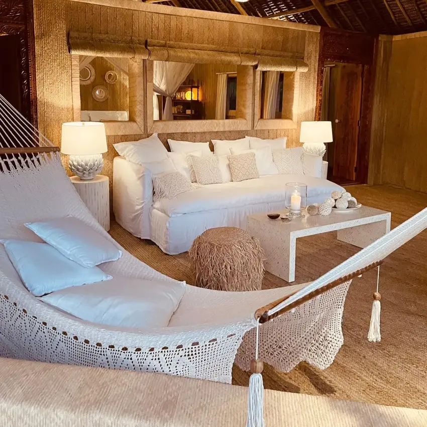 Luxury bedroom with white furnishings and natural fiber accents, Laba Fanjove, Zanzibar & Pemba, Tanzania