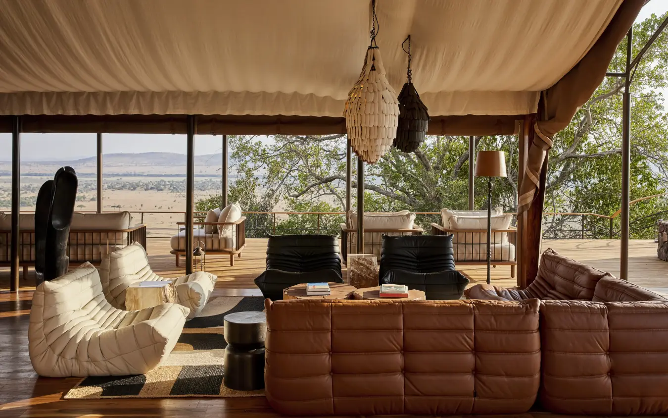 Luxury safari lounge with panoramic savanna views and contemporary furnishings, Laba Grumeti Art Lodge, Serengeti National Park, Tanzania