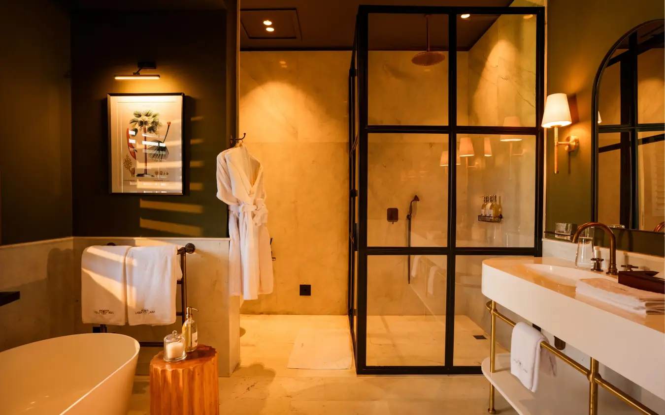 Luxury bathroom with walk-in shower and freestanding soaking tub, Laba Ngorongoro Lodge, Ngorongoro Crater, Tanzania
