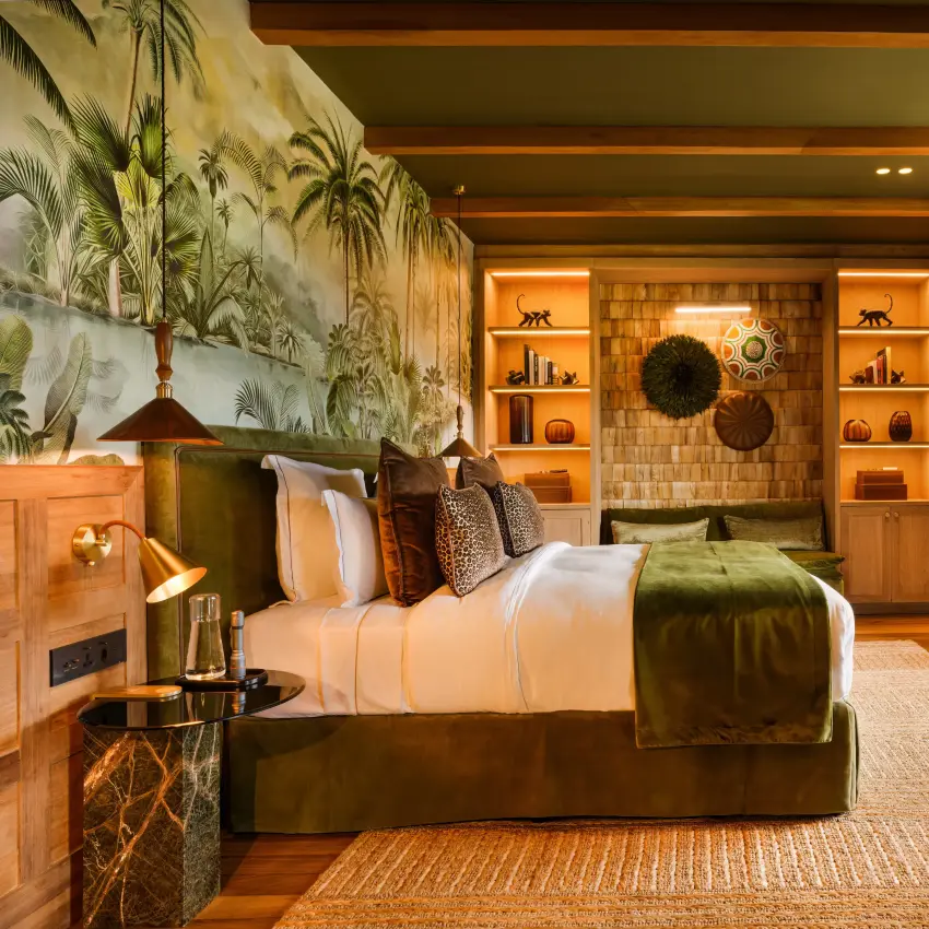 Luxury bedroom suite with warm wood paneling and views to terrace, Laba Ngorongoro Lodge, Ngorongoro Crater, Tanzania